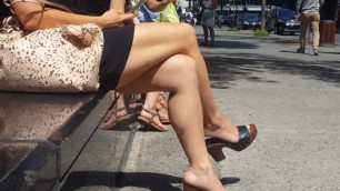 Sexy Fcrossed Legs and Eet in Wooden Clogs